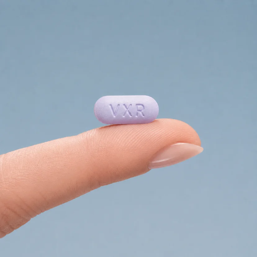 Venlafaxine XR tablet resting on a finger